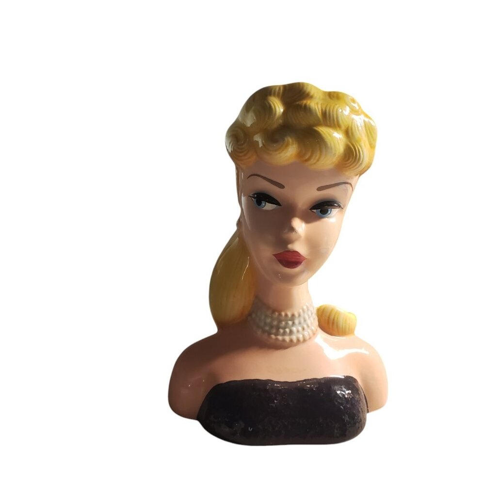 Vintage Barbie head vase, specifically the “Solo In The Spotlight” Edition